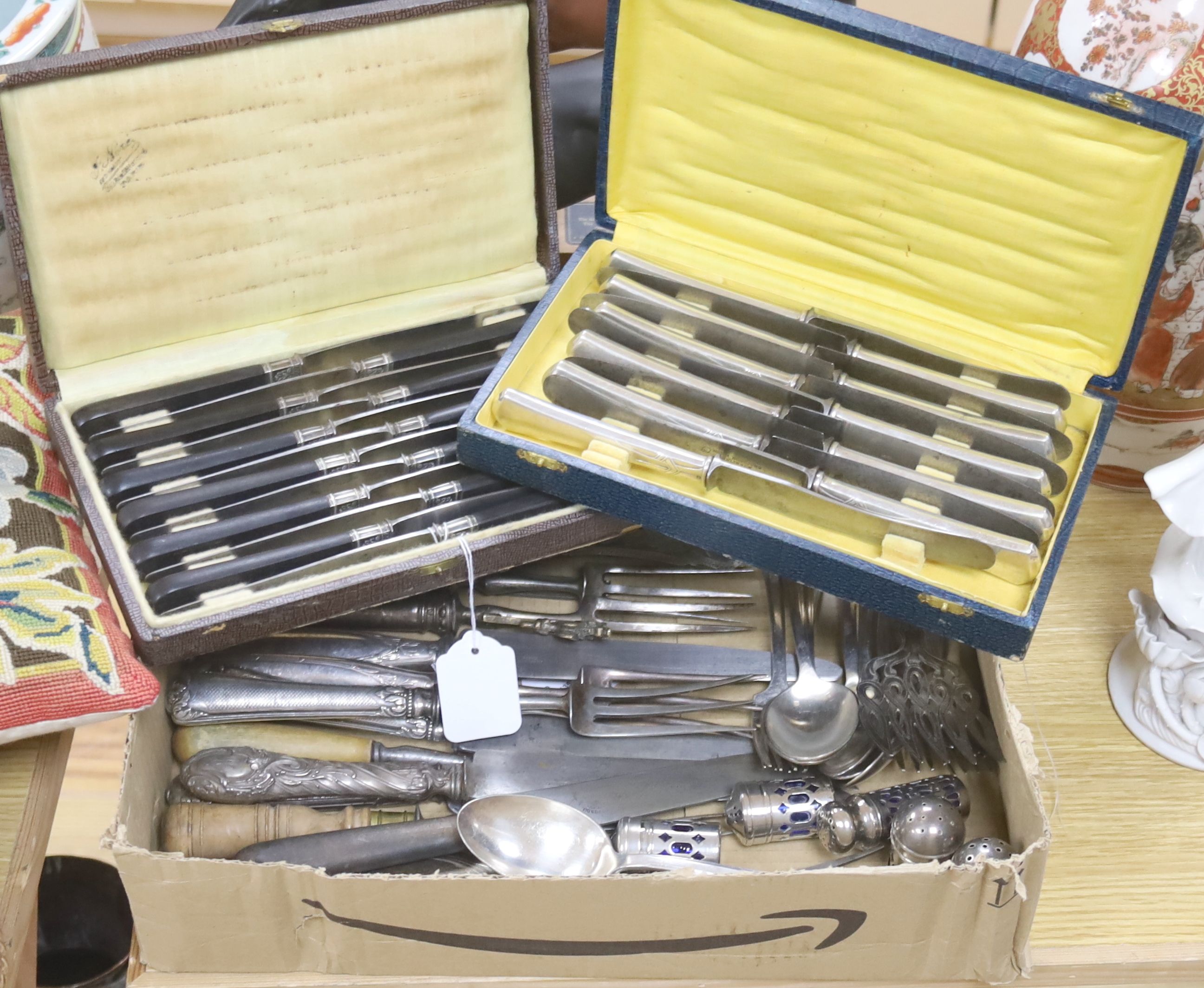 A set of twelve J. Nore, Paris Empire style table knives with hardwood handles (cased) and sundry flatware